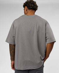 Man wearing AfterDark ZeroCrease Oversized Tee - Storm Front | Model:Xav | Size:L