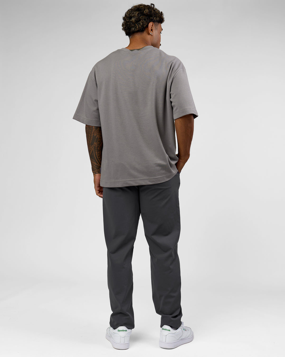 Man wearing AfterDark ZeroCrease Oversized Tee - Storm Front | Model:Xav | Size:L