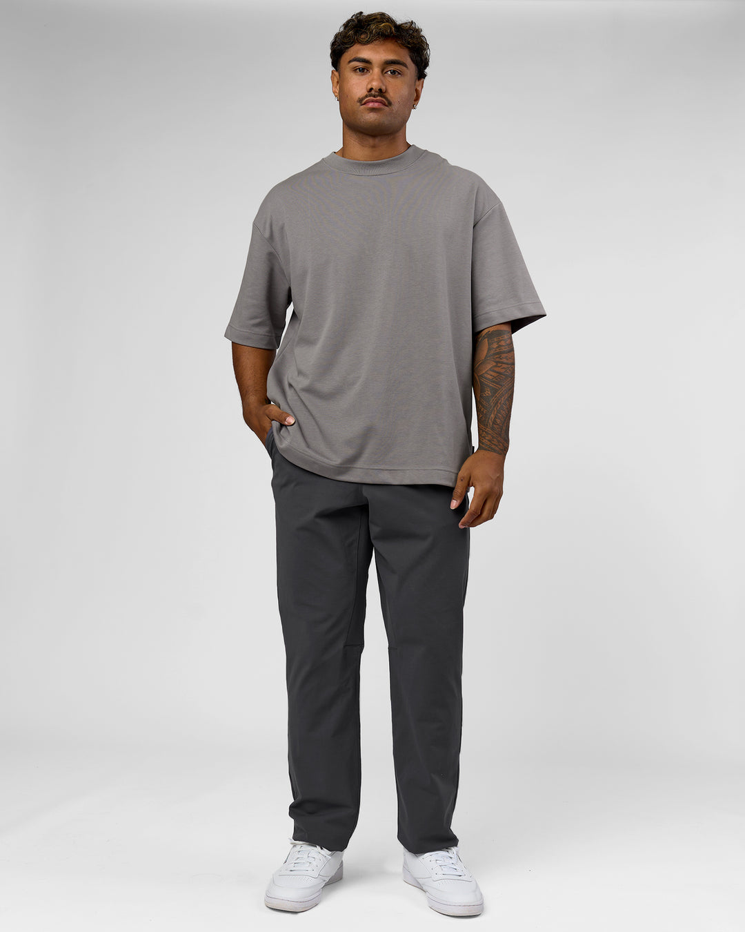Man wearing AfterDark ZeroCrease Oversized Tee - Storm Front | Model:Xav | Size:L