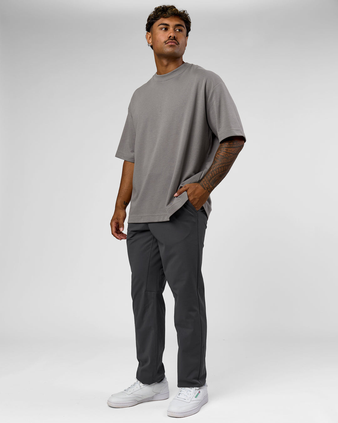 Man wearing AfterDark ZeroCrease Oversized Tee - Storm Front | Model:Xav | Size:L