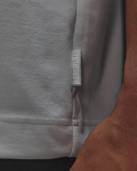 Man wearing AfterDark ZeroCrease Oversized Tee - White | Model:Jackson | Size:L