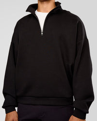 Man wearing AfterDark ZeroCrease Quarter Zip - Black | Model:Jackson | Size:L