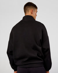 Man wearing AfterDark ZeroCrease Quarter Zip - Black | Model:Jackson | Size:L