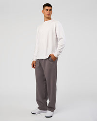 Man wearing AfterDark ZeroCrease Straight Leg Pant - Duskstone | Model:Jackson | Size:L