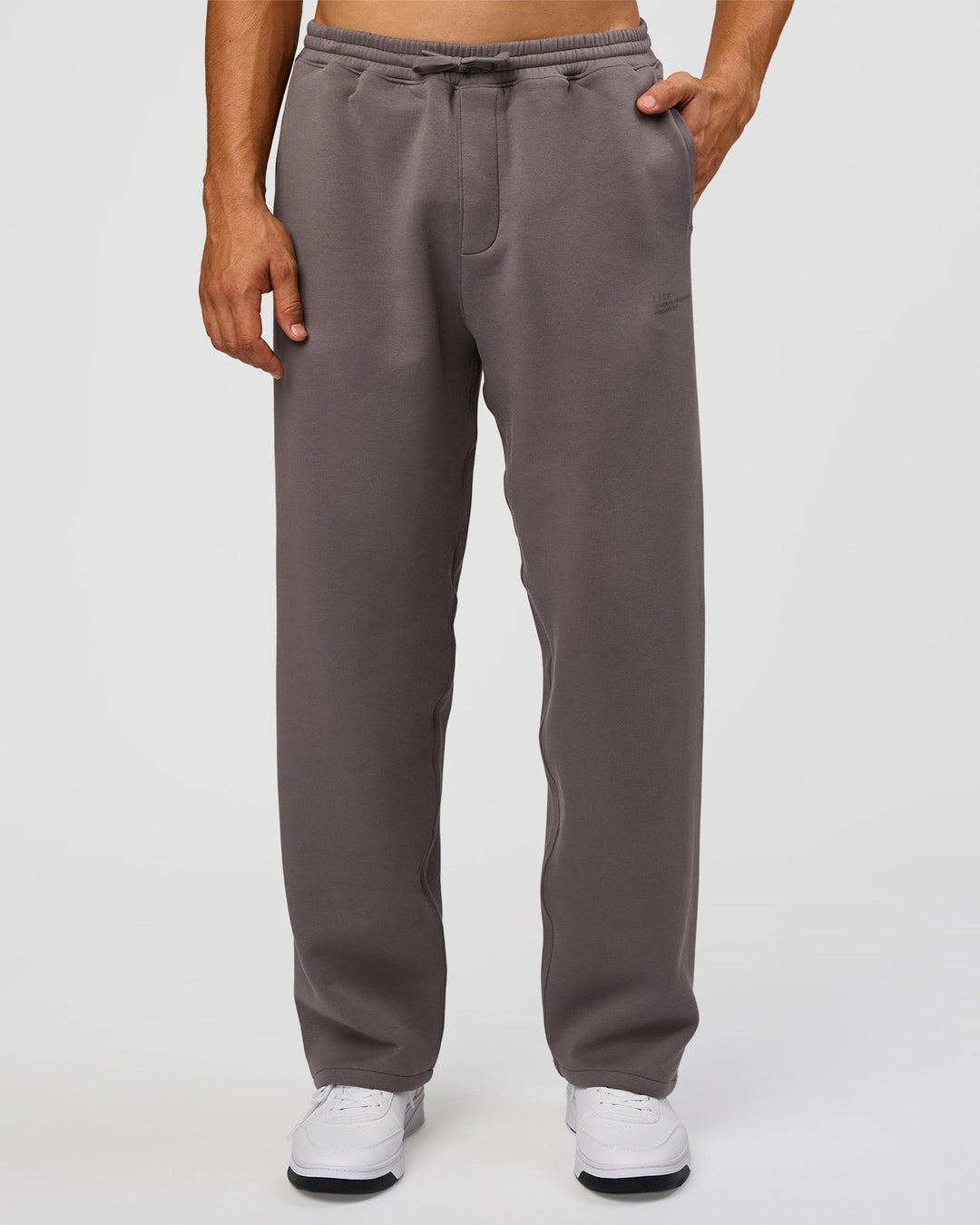 Man wearing AfterDark ZeroCrease Straight Leg Pant - Duskstone | Model:Jackson | Size:L