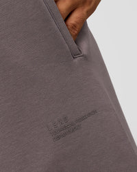 Man wearing AfterDark ZeroCrease Straight Leg Pant - Duskstone | Model:Jackson | Size:L