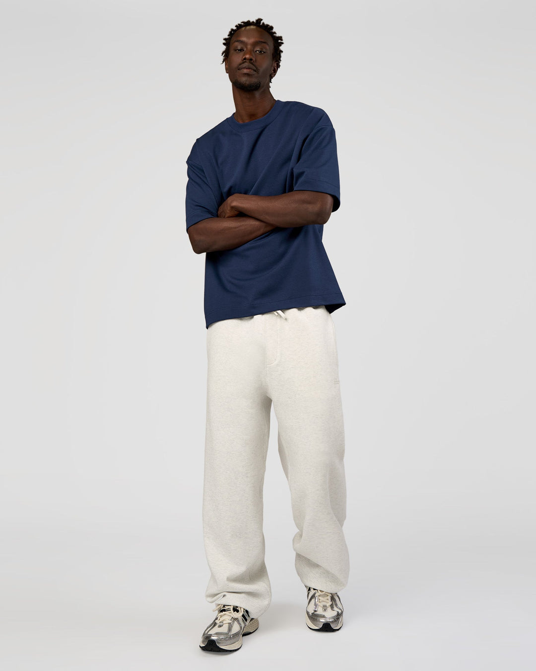 Man wearing AfterDark ZeroCrease Straight Leg Pant - Silver Marl | Model:Okello | Size:L