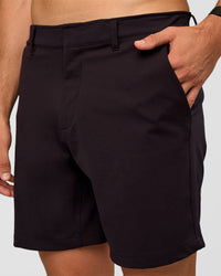 Man wearing All Day ZeroCrease™ Regular 8" Short - Black | Model:Liam | Size:34