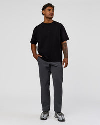 Man wearing All Day ZeroCrease™  Regular Pant - Dark Storm | Model:Xav | Size:L