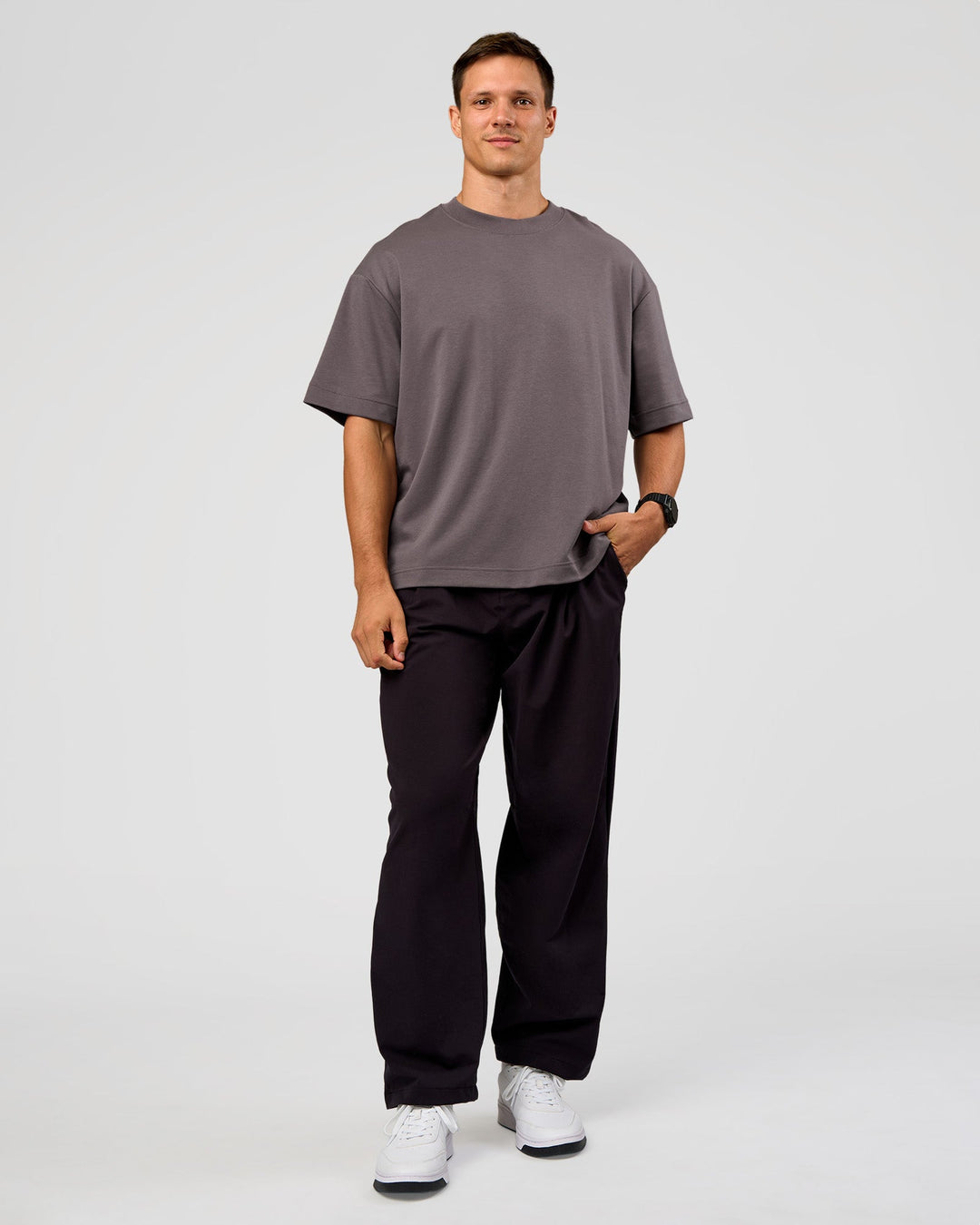 Man wearing All Day ZeroCrease™ Wide Leg Pant - Black | Model:Liam | Size:34