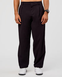 Man wearing All Day ZeroCrease™ Wide Leg Pant - Black | Model:Liam | Size:34