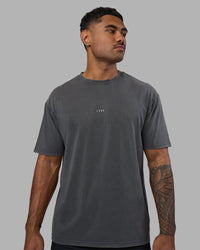Man wearing Base FLXCotton Tee Oversized - Dark Storm Washed | Model:Xav | Size:L