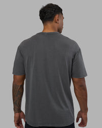 Man wearing Base FLXCotton Tee Oversized - Dark Storm Washed | Model:Xav | Size:L