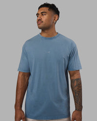 Man wearing Base FLXCotton Tee Oversized - Elemental Blue Washed | Model:Xav | Size:L