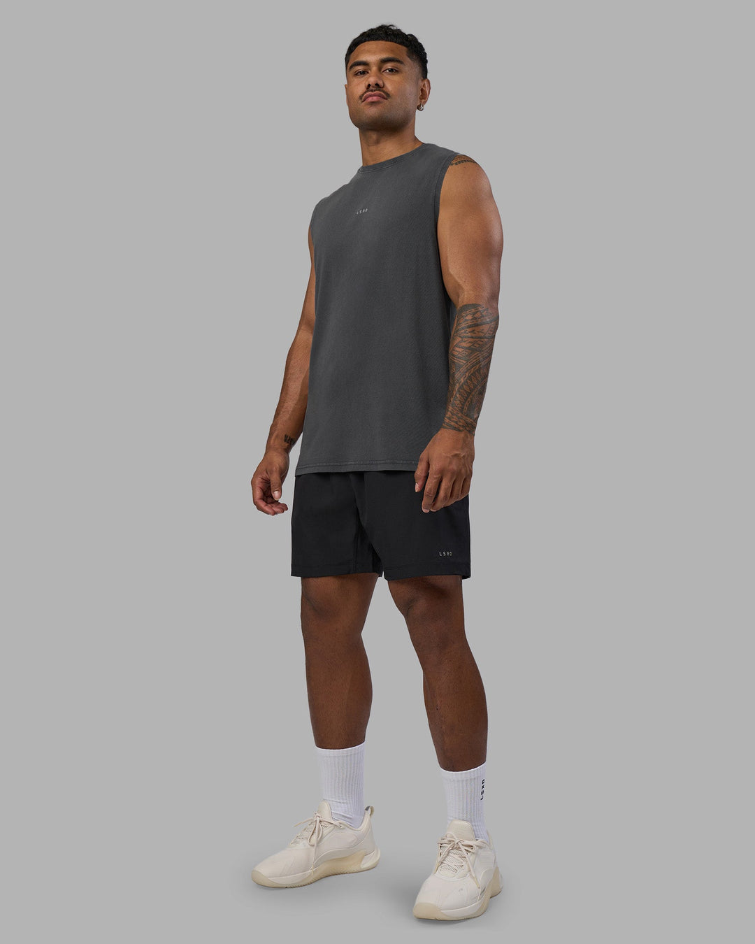 Man wearing Base FLXCotton Tank - Dark Storm Washed | Model:Xav | Size:L