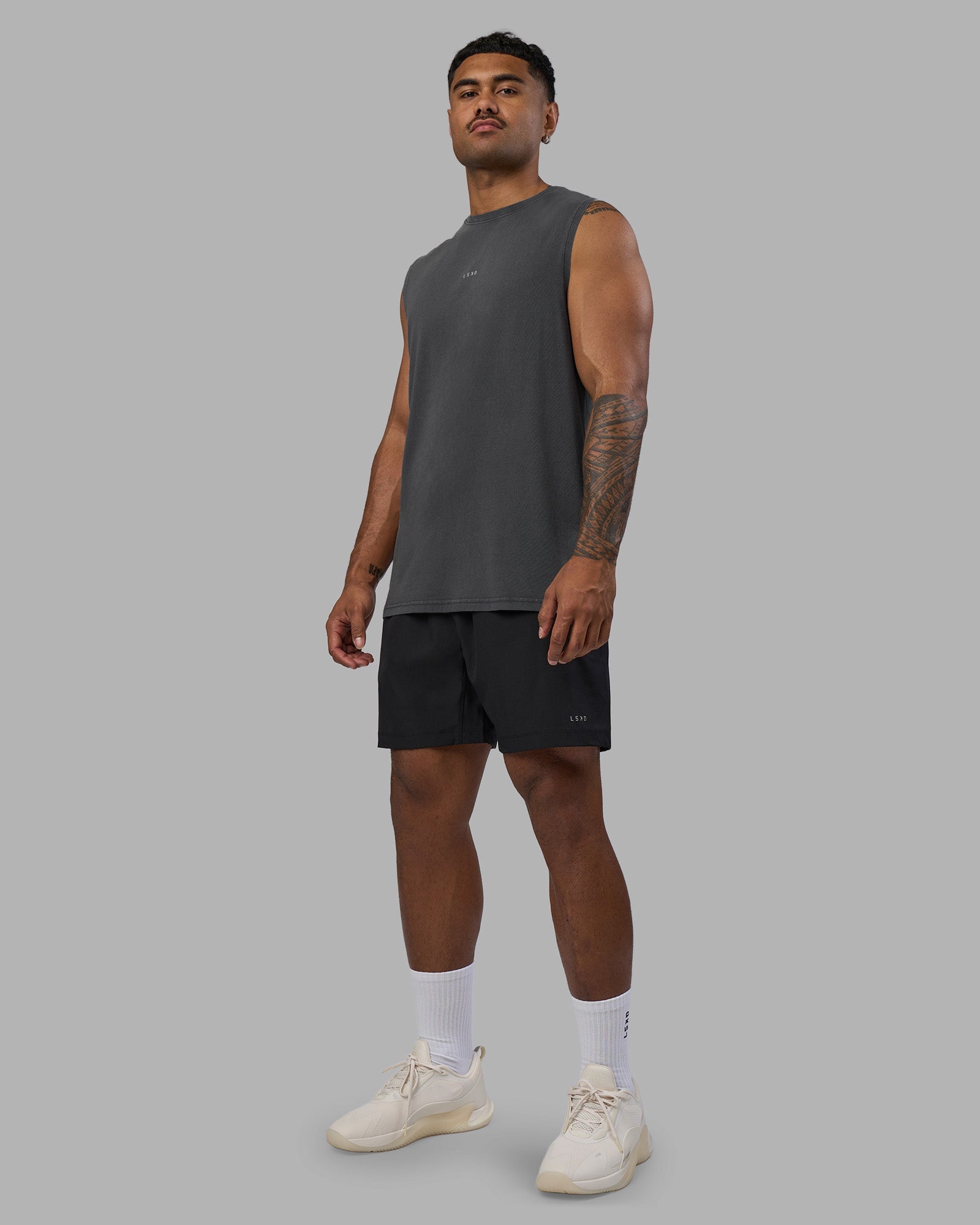 Man wearing Base FLXCotton Tank - Dark Storm Washed | Model:Xav | Size:L