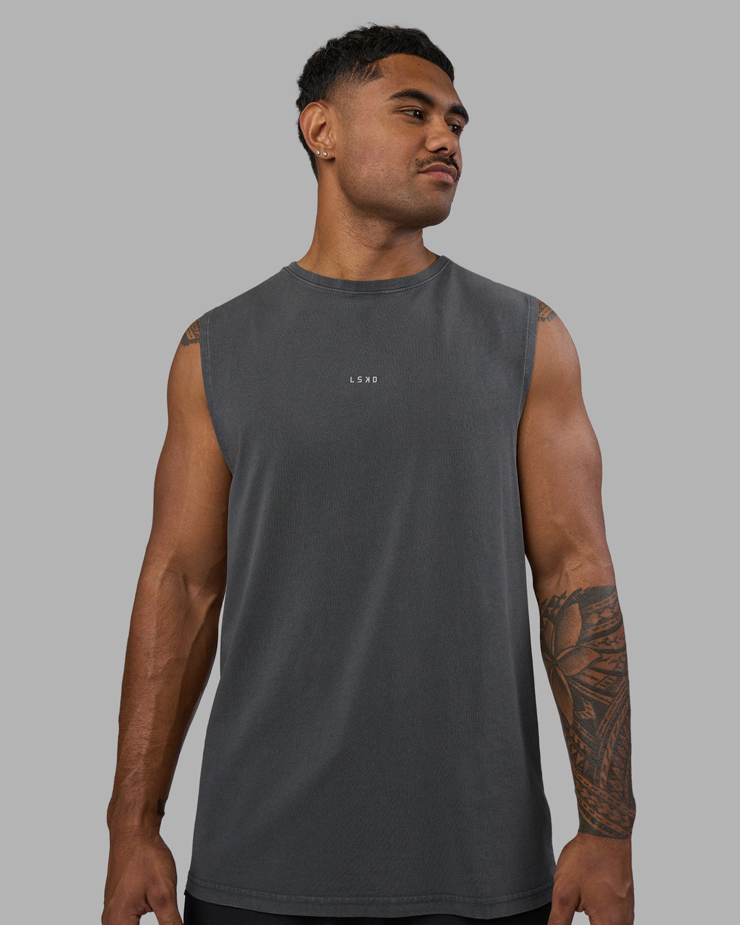 Man wearing Base FLXCotton Tank - Dark Storm Washed | Model:Xav | Size:L