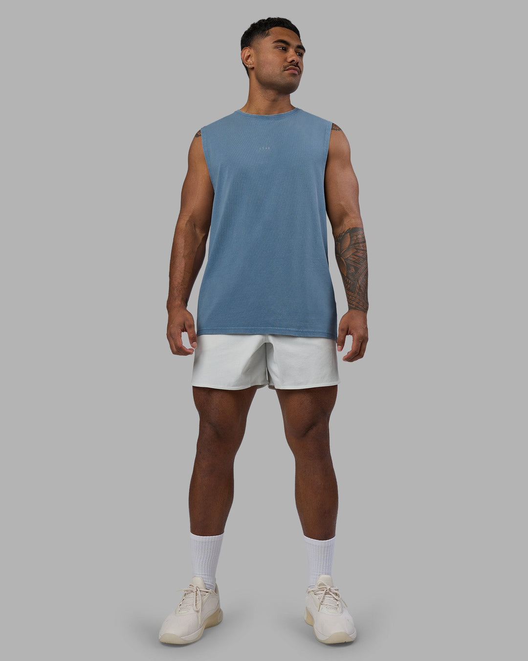 Man wearing Base FLXCotton Tank - Elemental Blue Washed | Model:Xav | Size:L