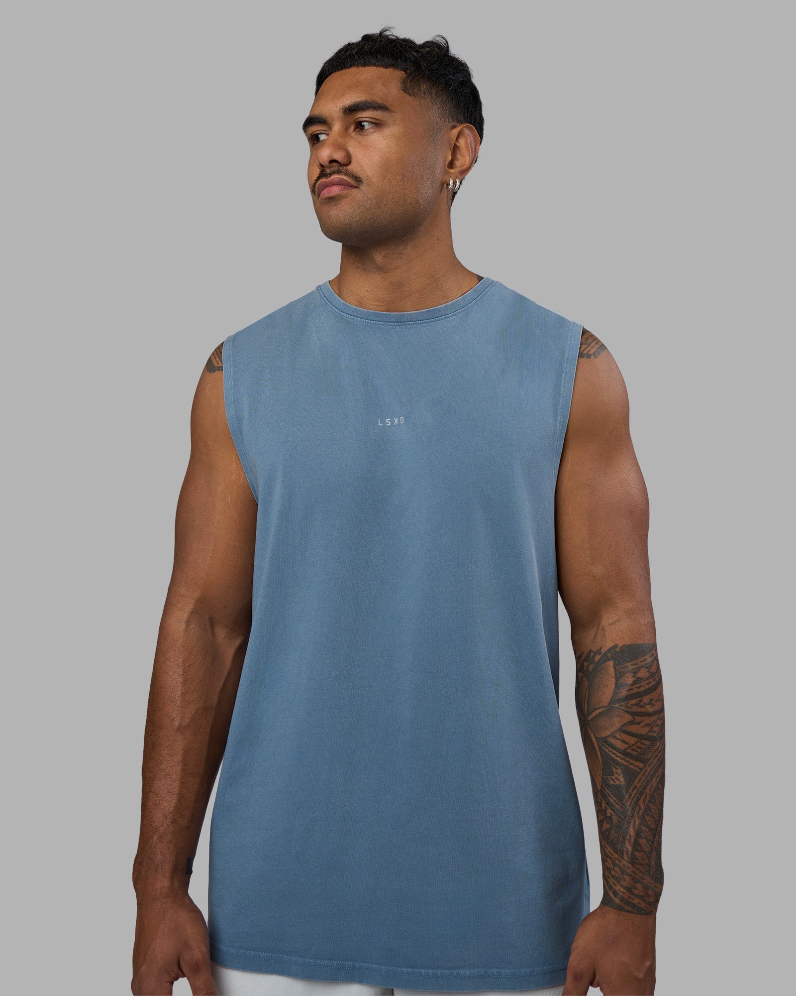 Man wearing Base FLXCotton Tank - Elemental Blue Washed | Model:Xav | Size:L