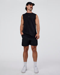 Man wearing Base FLXCotton Tank Regular Fit +2cm - Black | Model:Adam | Size:L