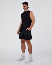 Man wearing Base FLXCotton Tank Regular Fit +2cm - Black | Model:Adam | Size:L