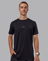 Man wearing Base FLXCotton Tee - Black | Model:Tom | Size:L