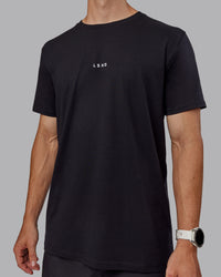 Man wearing Base FLXCotton Tee - Black | Model:Tom | Size:L