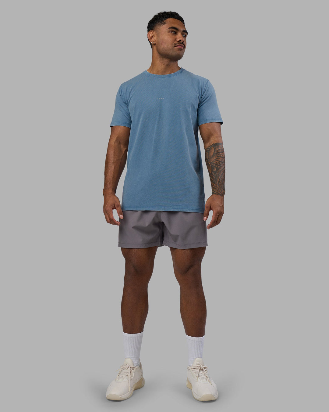 Man wearing Base FLXCotton Tee - Elemental Blue Washed | Model:Xav | Size:L