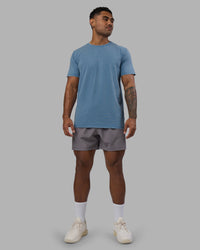 Man wearing Base FLXCotton Tee - Elemental Blue Washed | Model:Xav | Size:L