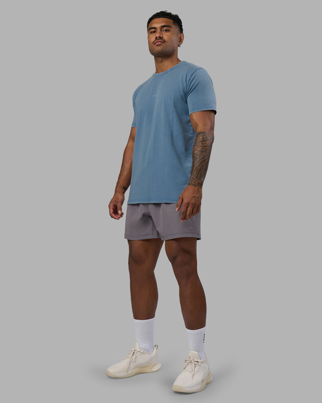 Man wearing Base FLXCotton Tee - Elemental Blue Washed | Model:Xav | Size:L