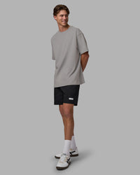 Man wearing Base FLXCotton Tee Oversized - Circular-Grey  Model:Brandon | Size:L | Thumbnail Index: 3