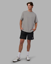 Man wearing Base FLXCotton Tee Oversized - Circular-Grey  Model:Brandon | Size:L | Thumbnail Index: 4