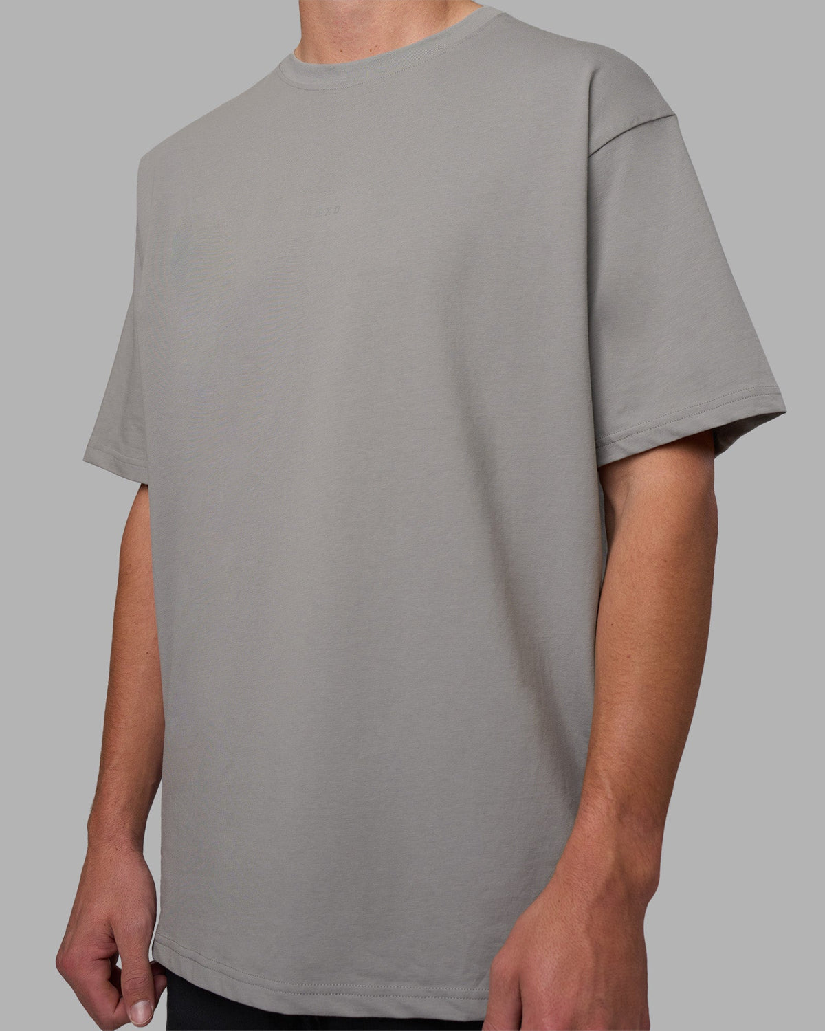 Man wearing Base FLXCotton Tee Oversized - Circular-Grey  Model:Brandon | Size:L - view 2