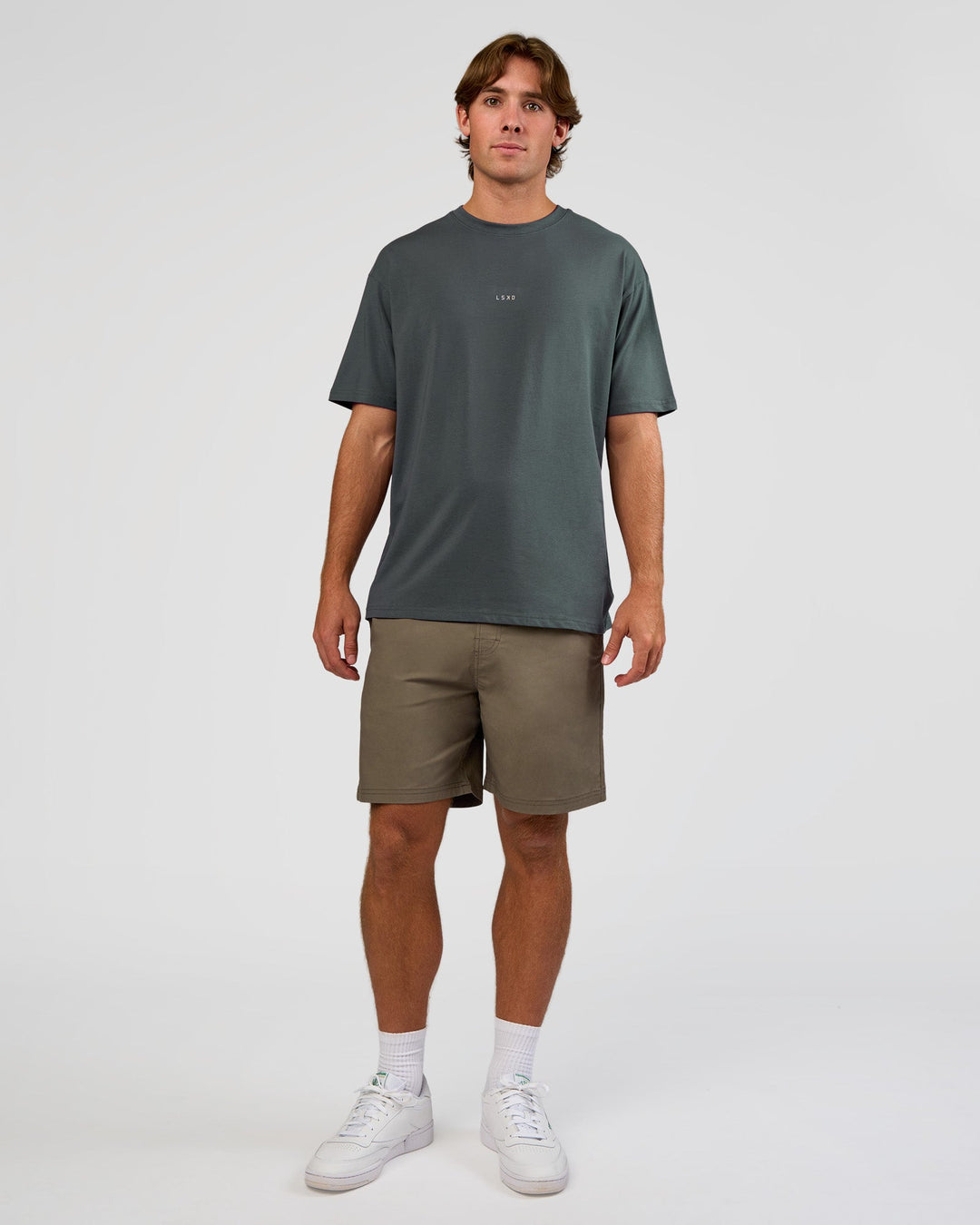 Man wearing Base FLXCotton Tee Oversized - Dark Slate | Model:Marcus | Size:L