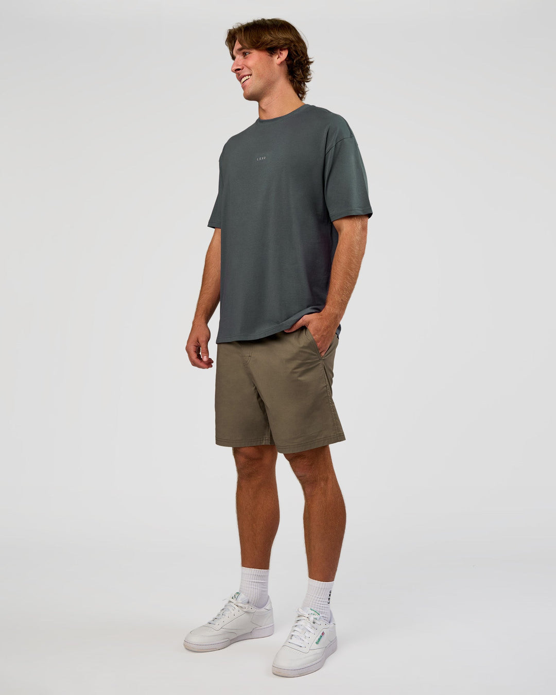 Man wearing Base FLXCotton Tee Oversized - Dark Slate | Model:Marcus | Size:L