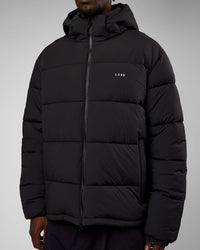 Man wearing Base Puffer Jacket - Black | Model:Okello | Size:L