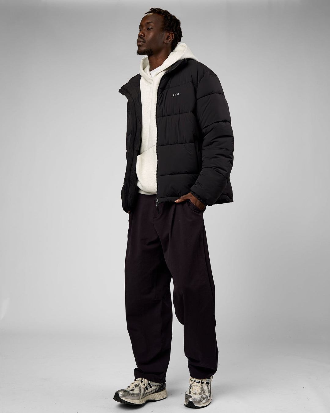 Man wearing Base Puffer Jacket - Black | Model:Okello | Size:L