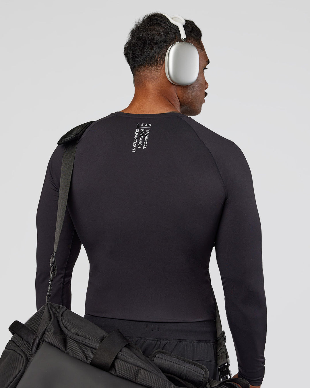 Man wearing BaseTech Long Sleeve Tee - Black | Model:Xav | Size:L