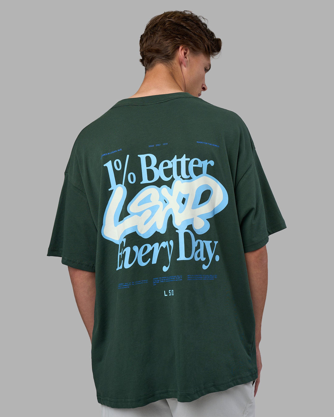 Man wearing Break Through Heavyweight Oversized Tee - Vital Green-Open Air | Model:Brandon | Size:L