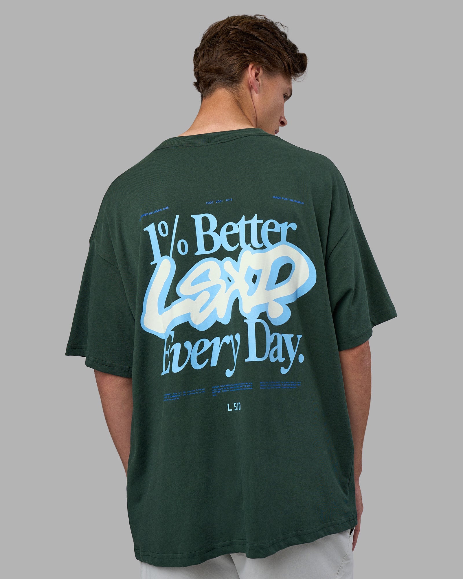 Man wearing Break Through Heavyweight Oversized Tee - Vital Green-Open Air | Model:Brandon | Size:L