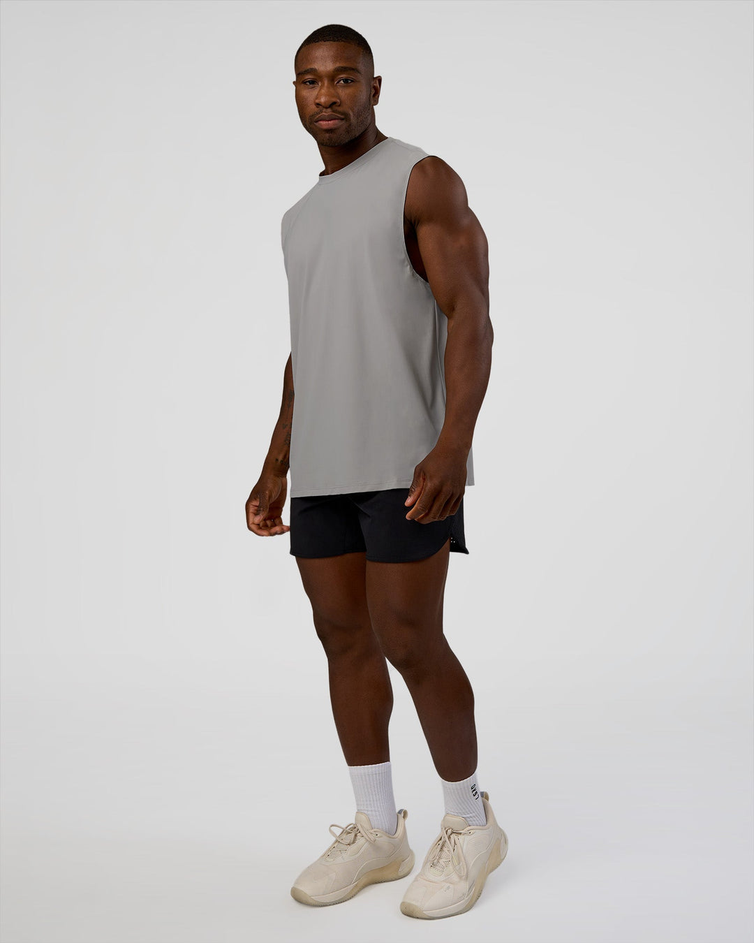 Man wearing Cadence MicroMotion Muscle Tank - Alloy | Model:Sam | Size:L