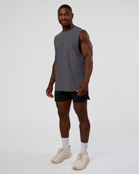 Man wearing Cadence MicroMotion Muscle Tank - Dark Storm | Model:Sam | Size:L
