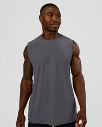 Man wearing Cadence MicroMotion Muscle Tank - Dark Storm | Model:Sam | Size:L