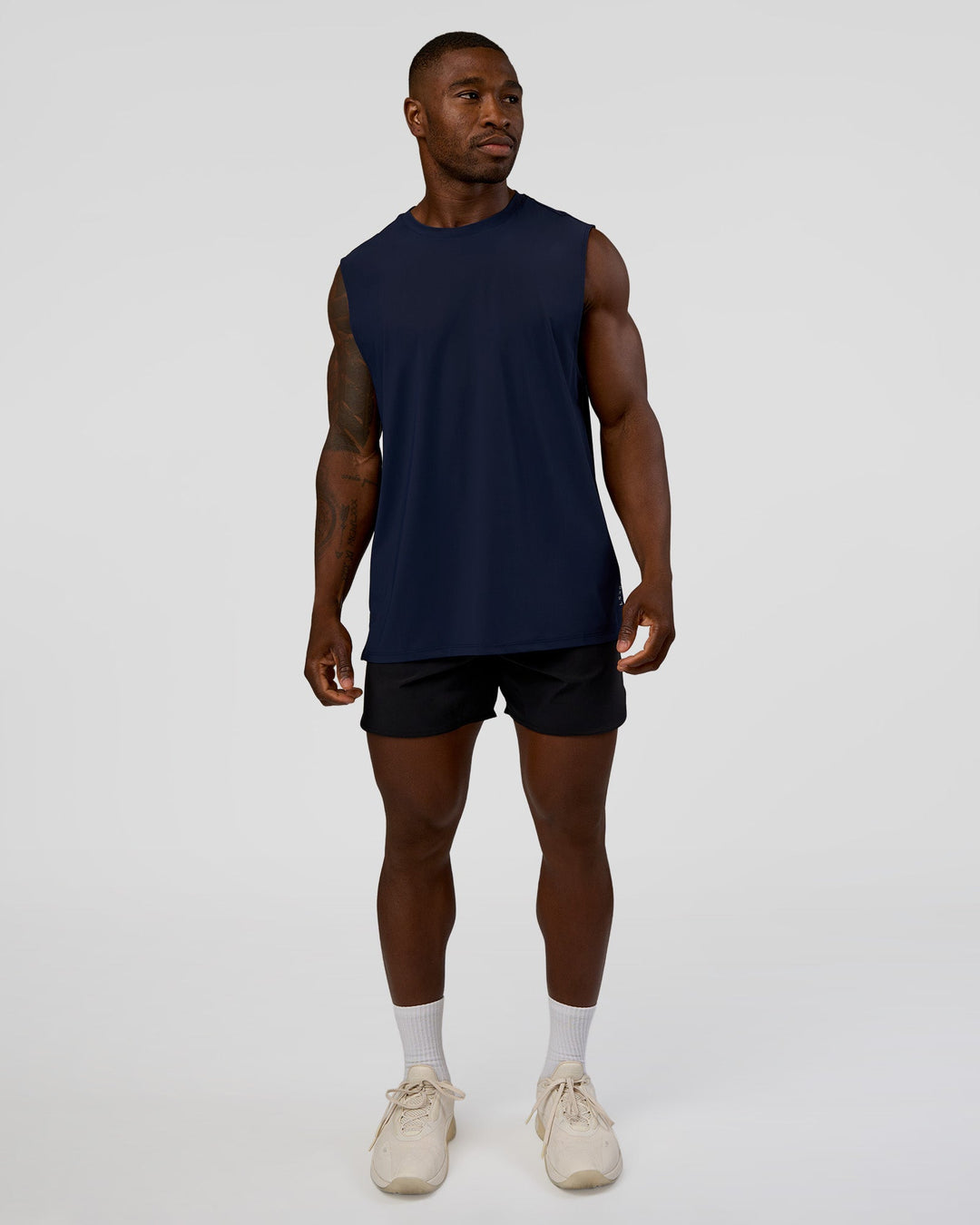 Man wearing Cadence MicroMotion Muscle Tank - Future Navy | Model:Sam | Size:L - view 5