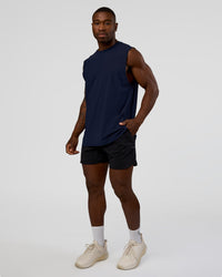 Man wearing Cadence MicroMotion Muscle Tank - Future Navy | Model:Sam | Size:L | Thumbnail Index: 1