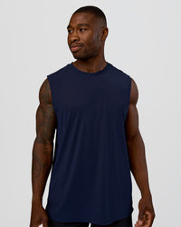 Man wearing Cadence MicroMotion Muscle Tank - Future Navy | Model:Sam | Size:L | Thumbnail Index: 0