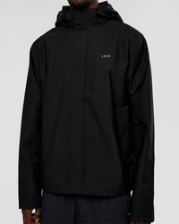 Man wearing Coaches Jacket - Black | Model:Okello | Size:L