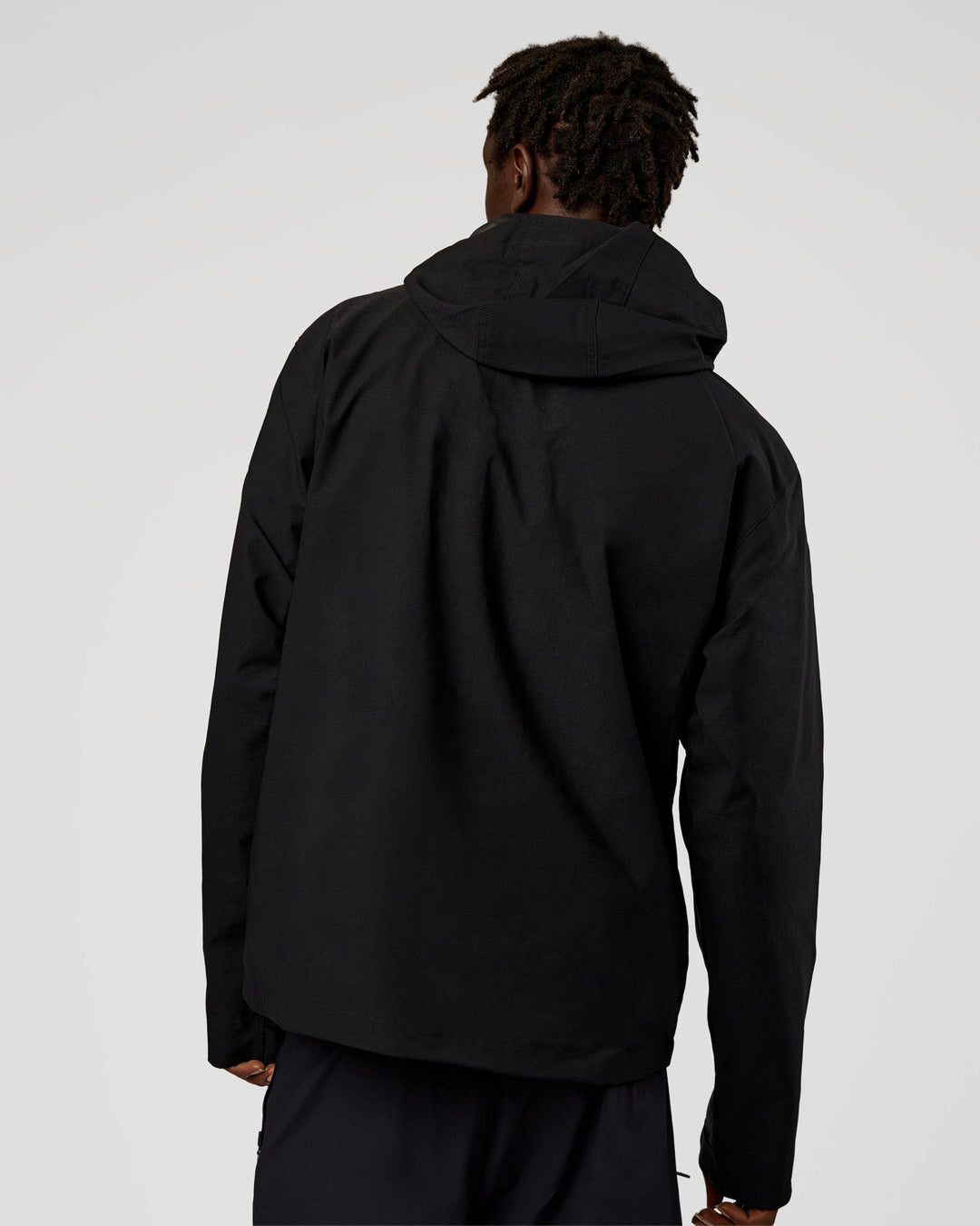 Man wearing Coaches Jacket - Black | Model:Okello | Size:L