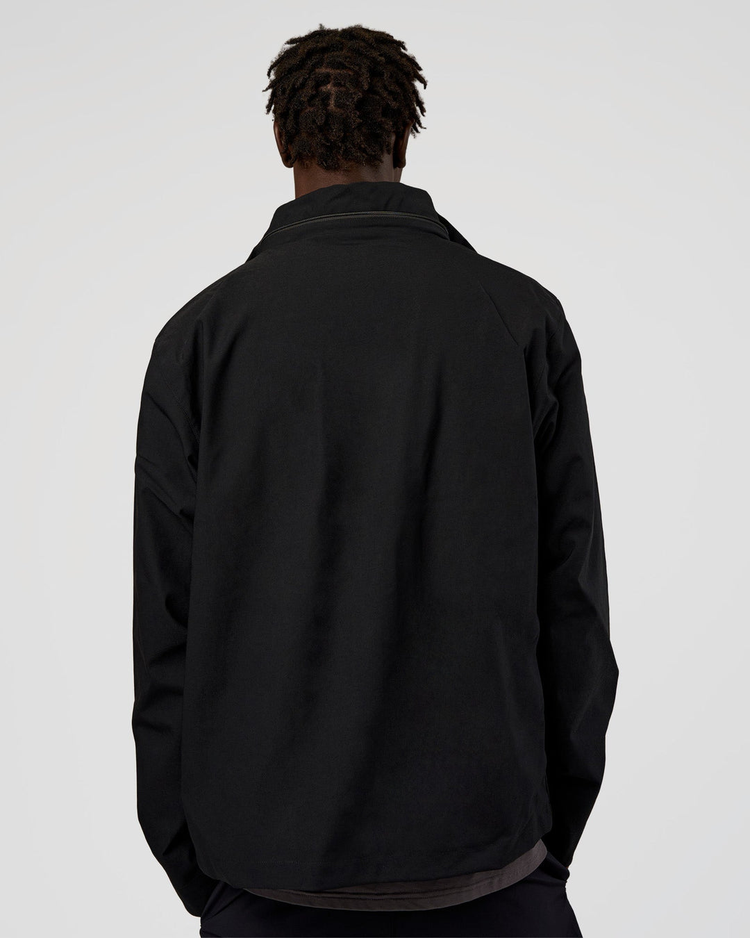Man wearing Coaches Jacket - Black | Model:Okello | Size:L