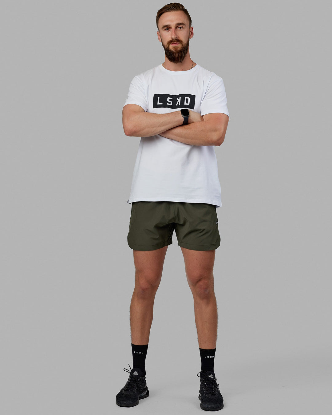 Man wearing Competition 5" Performance Short - Forest Night